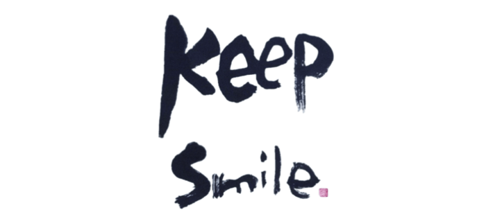 作品画像2 炭で「Keep Smile」と描かれた作品